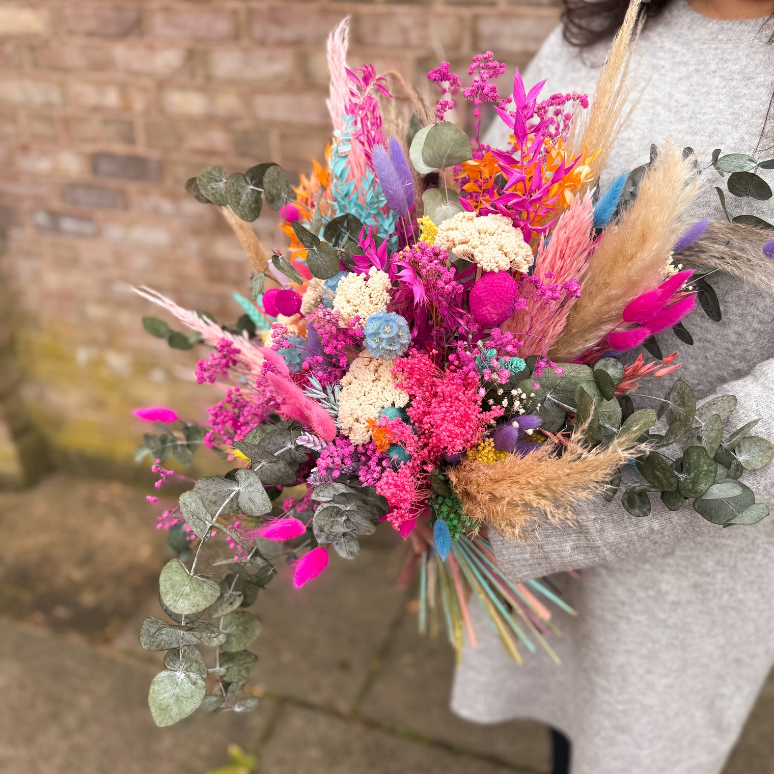 Whimsical Rainbow Bridal Bouquet with Eucalyptus